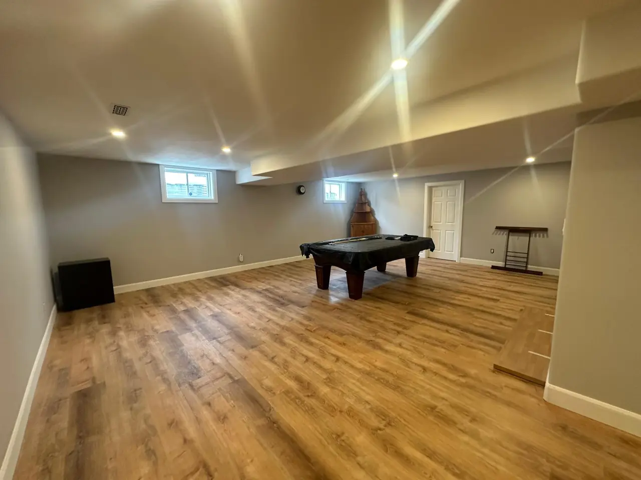 Basement games room by MATCON INC.