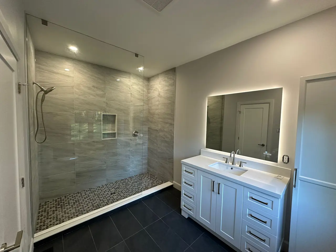 Large walk-in shower by MATCON INC.