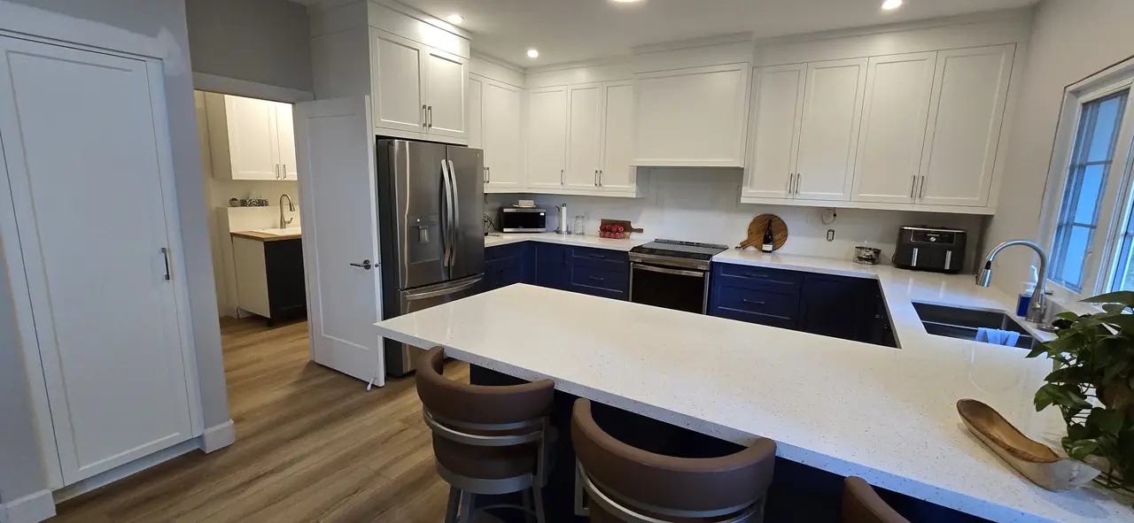 Finished MATCON family kitchen with island seating.